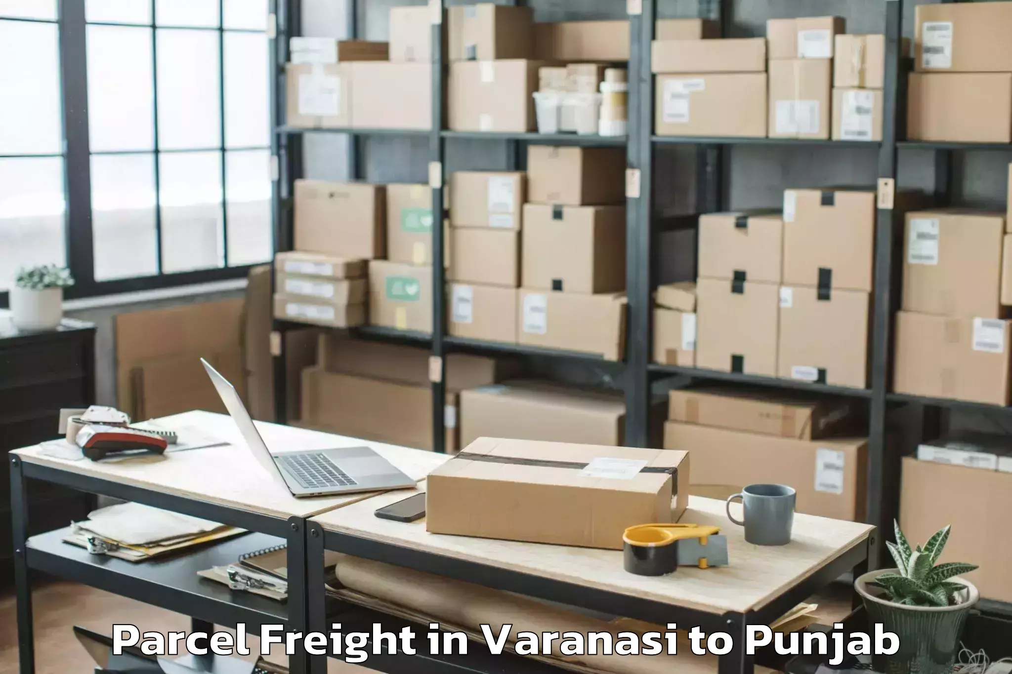 Book Varanasi to Dasuya Parcel Freight Online